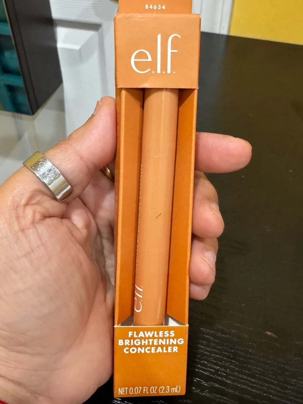 ELF Flawless Brightening Concealer in Tan 48 N with neutral warm undertones
